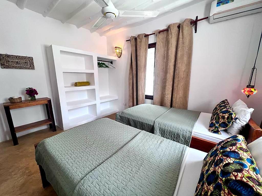 Moyo Apartment Pwani Mchangani Extérieur photo
